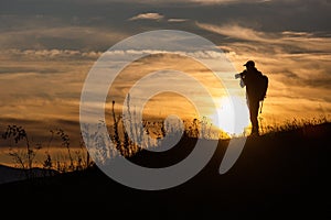 Silhouette of Photographer at sunset.
