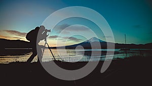 Silhouette Of Photographer Taking Photo At Mount Fuji