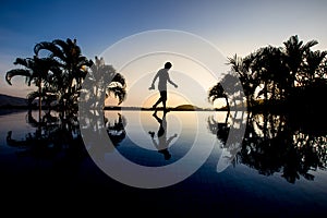 Silhouette photographer walking