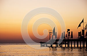 Silhouette pier with beautiful sunrise sky