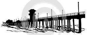 Silhouette of a pier with waves