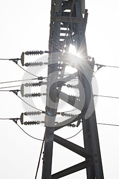 silhouette pole against sunlight electricity power lines