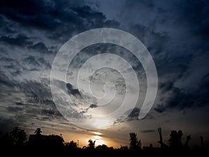 Silhouette of Pondicherry rooftops at sunrise