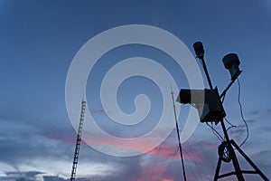 Silhouette of Portable Automatic Weather Station at Ngurah Rai airport under morning sky. This tool has a function to measuring