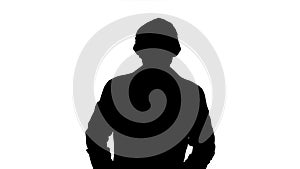 Silhouette Portrait of medical doctor putting mask and hat on.