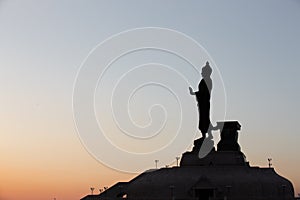 Silhouette Of The Posture Of Walking Buddhist Statue