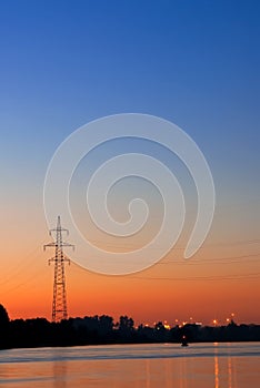 Silhouette of a power transmission line support