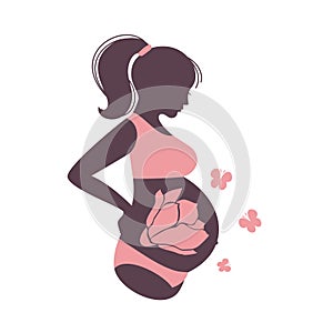 Silhouette of a pregnant girl with a big belly