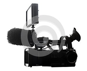 Silhouette of a profesional video camera