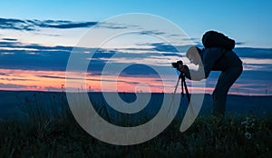 Silhouette of a professional photographer