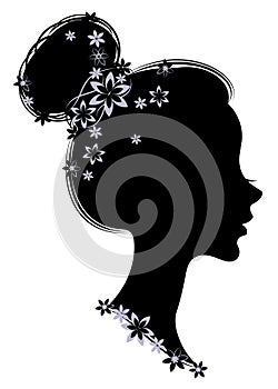 Silhouette profile of a cute lady s head. The girl has long beautiful hair, decorated with purple flowers. Suitable for