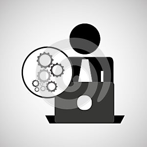 Silhouette programmer working laptop gears