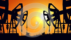 Silhouette pump jacks at sunset. Oil industry.