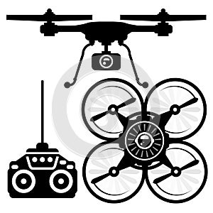 Silhouette of quadcopter and remote control photo