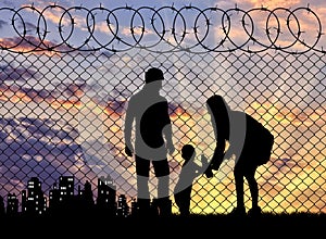 Silhouette of refugee families