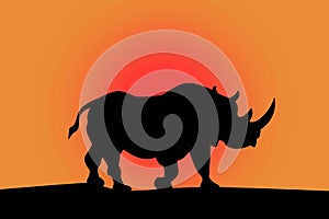 Silhouette of rhino on a red