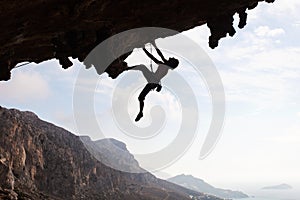 Silhouette of a rock climber