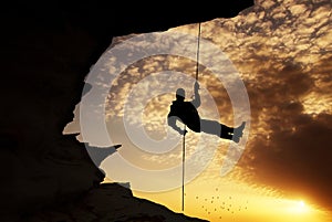 Silhouette of rock climber