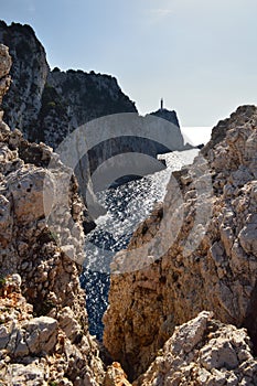 Silhouette of Rocky Cape with Lighthouse