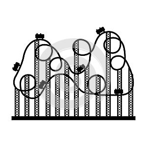 silhouette roller coaster in amusement park