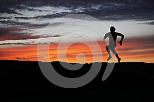 Silhouette of runner during outdoor cross-country running