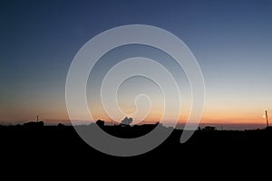 Silhouette of rural village landscape.