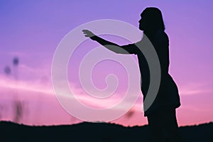 Silhouette of sadness woman standing