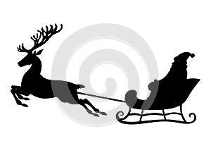 Silhouette Santa flying on deer sleigh