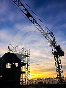 Silhouette of scaffolding in the construction site