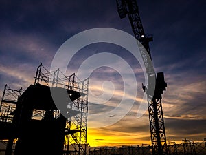 Silhouette of scaffolding in the construction site