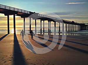 Silhouette and Shadows of Surfers along the Pacific Ocean, USA