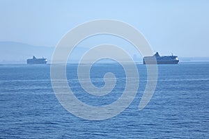 Silhouette of ship cruising on the sea