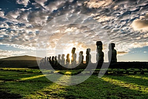 Silhouette shot of Moai statues in Easter Island photo