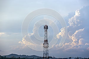 Silhouette signal antenna tower at sunrise sky