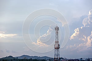 Silhouette signal antenna tower at sunrise sky