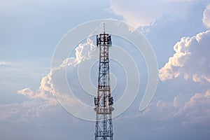 Silhouette signal antenna tower at sunrise sky