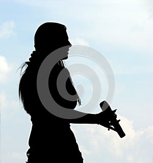 Silhouette Of Singing Girl