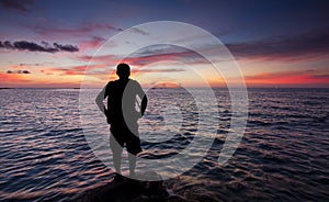 Silhouette of a single man at sunset