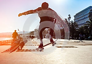 Silhouette of skateboarder in the city