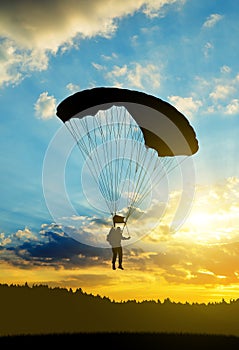 Silhouette skydiver parachutist