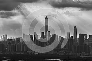 Silhouette of skyline of Shenzhen city, China under sunset. Viewed from Hong Kong border