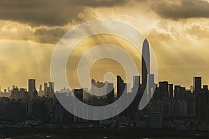 Silhouette of skyline of Shenzhen city, China under sunset. Viewed from Hong Kong border