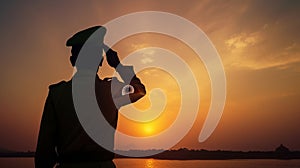 Silhouette of soldier saluting on a background of sunset or the sunrise. Greeting card for Independence day, Republic Day. India