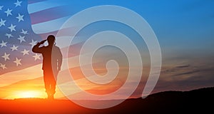 Silhouette of soldier saluting on background of USA flag. Greeting card for Veterans Day, Memorial Day.