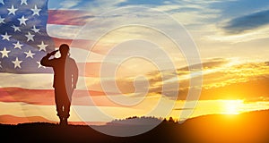 Silhouette of soldier saluting on background of USA flag. Greeting card for Veterans Day, Memorial Day.