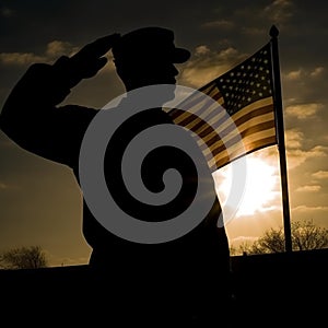 A silhouette of a soldier saluting the flag