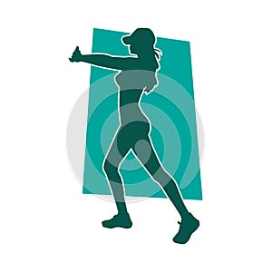 Silhouette of a sporty woman doing gym workout pose.