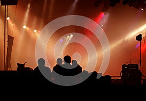 Silhouette of stage-crew and concert light