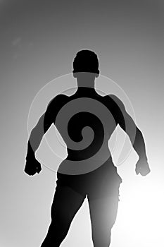 Silhouette of strong man