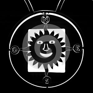 Silhouette of sun compass